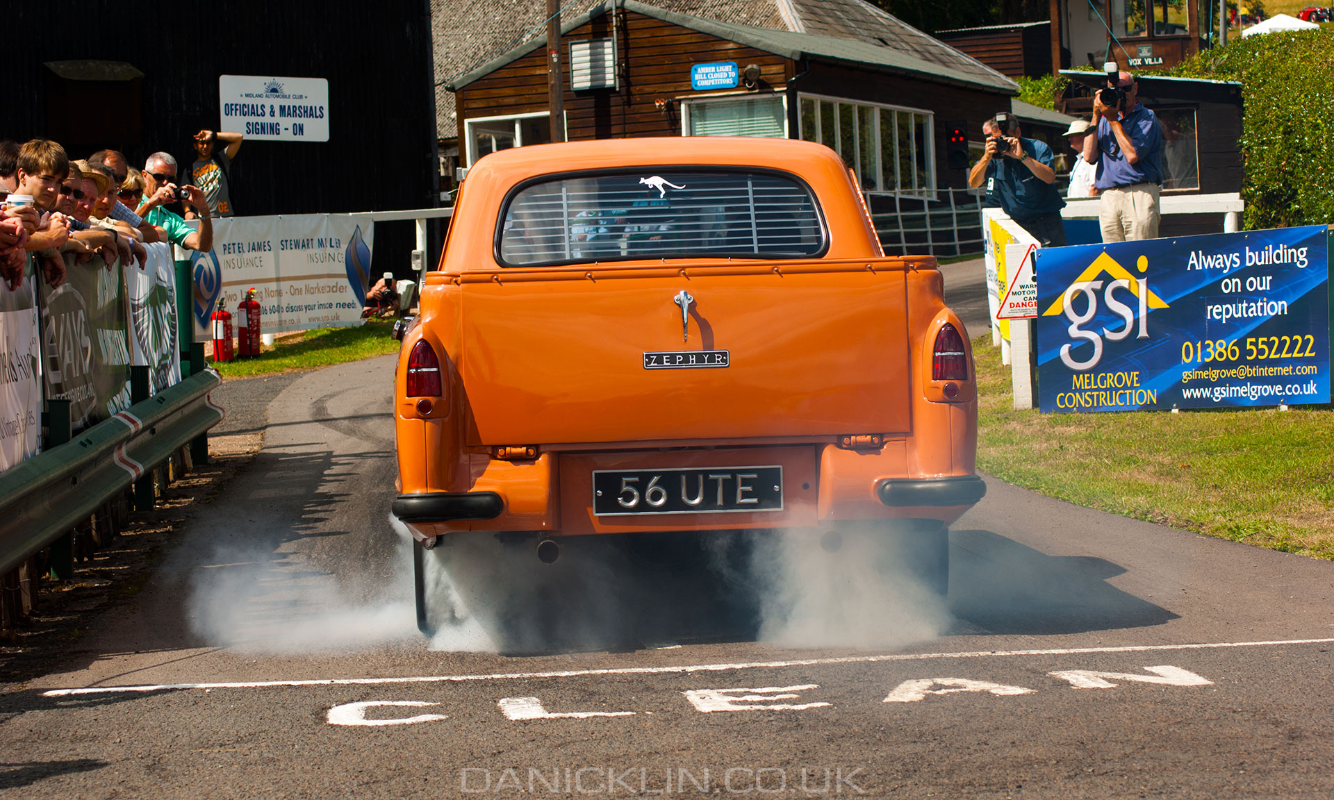 1956 Ford Zephyr Ute making an incredible amount of tire smoke on the start line